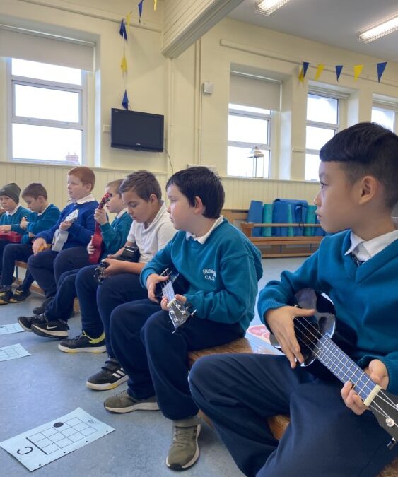 2nd Class have been learning to play the Ukulele with the help of Kevin from Music Generation
