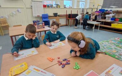 Senior Infants enjoying the estimation station